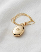 Cara Keepsakes Gold Pendant Urns Gold Oval Pendant Urn (10K)