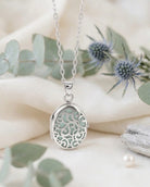 Cara Keepsakes Silver Locket Urns Silver Filigree Oval Locket Urn