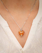 Cara Keepsakes Murano Glass Heart Urn - November worn on model
